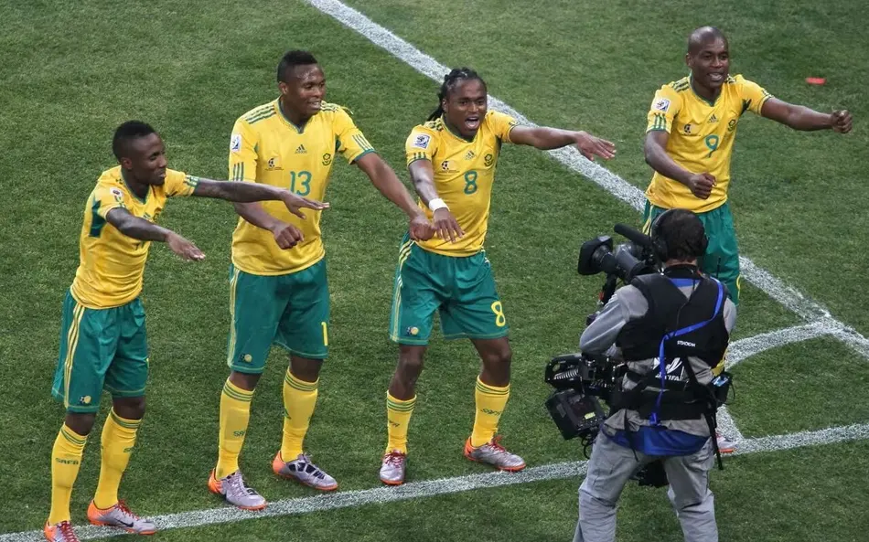 Siphiwe Tshabalala dances with South Africa team mates to celebrate scoring against Mexico in the opening match of the 2010 FIFA World Cup at Soccer City in Johannesburg aspect ratio 512 320